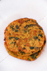 Delicious Indian Masala Puri or Methi Puri. Indian Bread Made of fenugreek leaves.