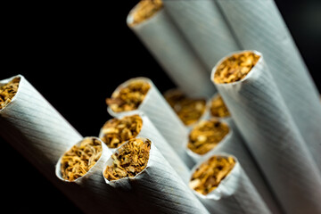 A pack of white cigarettes photographed close-up - 399766754
