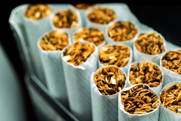 A pack of white cigarettes photographed close-up - 399767135