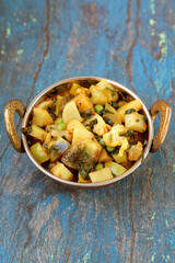 Indian recipe, mixed veg containing potato, Pea, CAULIFLOWER and Eggplant.