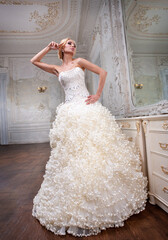 Beautiful bride twenty five years old in a white wedding dress