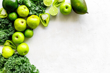 Frame of vegetarian food - green vegetables: cucumbers, broccoli, avocado