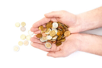 Hand holding euro coins. Euro coins money. Euro coins: 2, 1 euro, 50, 20, 10, 1 cents in the hands isolated on white background macro closeup. Money concept. 