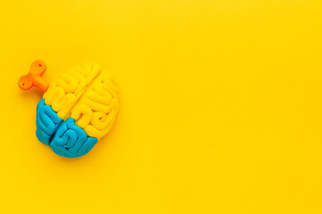 Ideas concept. Work of brain - model made of colorful clay, top view