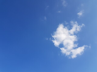 Sky blue background and beautiful clouds on a clear day.