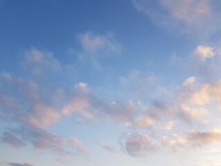 Naklejka na ściany i meble Sky blue background and beautiful clouds on a clear day.