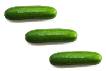 fresh natural green cucumber on a white background