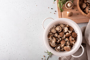 chopped forest mushrooms honey agarics in a white colander