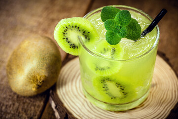 Cold summer drinks, Kiwi Lime, Mojito or caipirinha drink recipes, alcoholic cocktail, lemon or mint and fresh kiwis