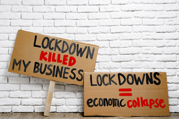Fototapeta na wymiar Protestive placard against coronavirus lockdowns close up