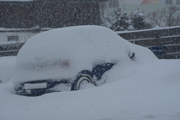 car and snow in winter