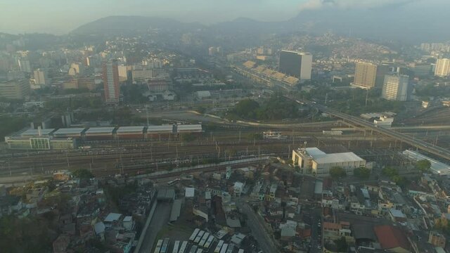 Early morning area of central Rio de Janeiro, Brazil showing main train station, highways and sambodrome cityscape with mountains in the background