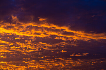 Fototapeta premium The colors of a burning sunset in the sky