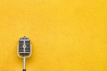 Retro style microphone. Aydio recording background. Top view