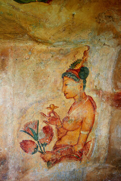  Sigiriya maiden with fruits: one of the 5th century frescoes at the ancient rock fortress of Sigiriya, a UNESCO World Heritage Site in Sri Lanka