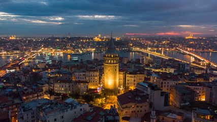 Fototapeta na wymiar Turkey's largest city at dawn. Aerial view of Galata tower in Istanbul, Turkie. European part of the city.
