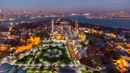 Turkey's largest city at dawn. Aerial view of Hagia Sophia mosque and view of Istanbul