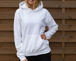 Front view of woman in hoodie sweatshirt mockup - 399783333