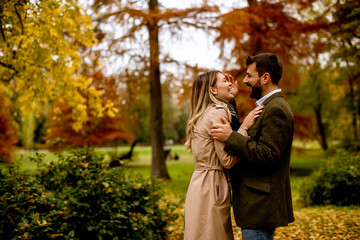 Young couple in the autumn park