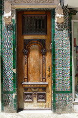  Cuba Old wooden door of a house on a street in Havana