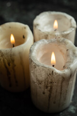 Ritual candles on wooden background