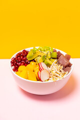 fresh healthy poke bowl with vegetables and fish