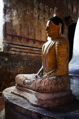 Ancient statues at Dambulla cave temple in Sri Lanka.