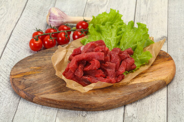 Raw beef meat sliced for cooking