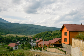 Fototapeta na wymiar cottage village on the carpathian mountains for rent
