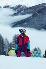 snowboarder in the Austrian mountains. winter time. The winter vacation. fun winter holidays in the mountains