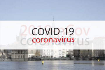 2019 ncov in red letters banner on the background of the Prague, Czech Republic