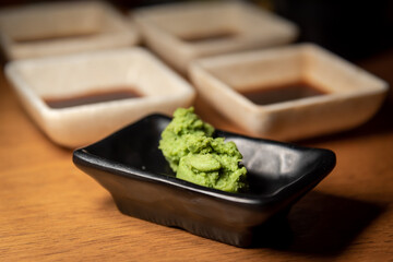 Mustard sauce, wasabi, pungent spicy condiment for sushi, pickles or salads
