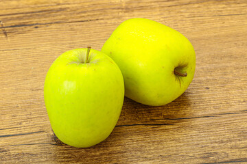 Two ripe green sweet apples