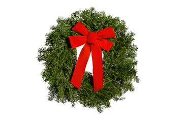 Festive evergreen Christmas wreath with red bow isolated on white background