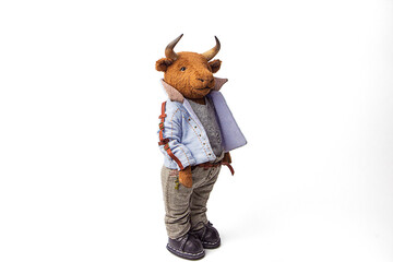 full-length portrait of a bull toy. isolated on white background.