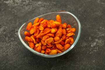 Chili peanut snack in the bowl