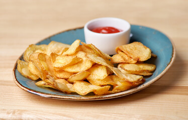 potato chips on plate - unhealthy food. Menu for beer in restaurant