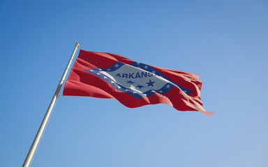 Arkansas US State Flag at sky background