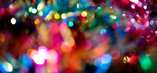 Christmas lights colorful bokeh background. Holiday festive atmosphere