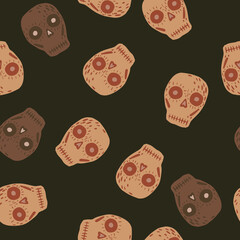 Random seamless pattern with mexican decor skull shapes. Brown background. Day of death print.