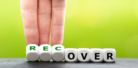 Hand turns dice and changes the word over to recover.