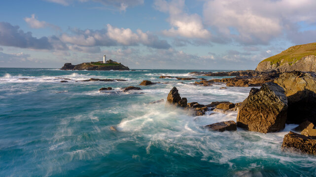 Autumn Sunset With Stormy Seas On Godrevy Island Light, Cornwall, UK