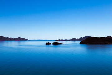Fototapeta premium View over blue ocean with small islands