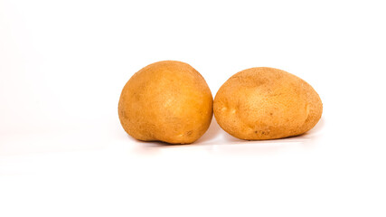Isolated fresh potato on white background.