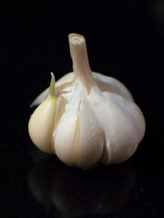 A piece of garlic with black background