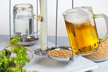 Home Brewing of Beer. Beer glass and raw material for beer production.