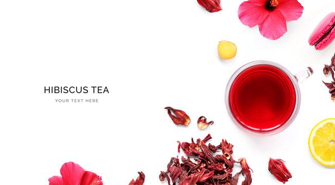 Creative layout made of cup of hibiscus tea, macaroons and lemon on a white background. Top view.
