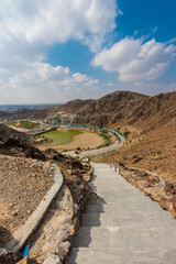 Amazing landscape of  Hajar mountains and mountain lake. Cloudy weather