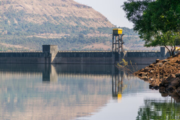 Panoramic view of Panshet dam wall with trees located in Pune, Maharashtra, India