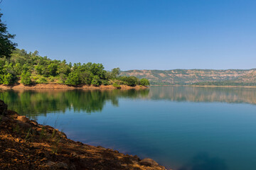 Panoramic view of beautiful Panshet dam with trees located in Pune, Maharashtra, India